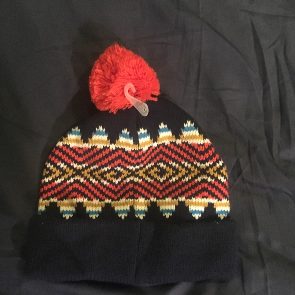 Multi colored beanie w/ poof
